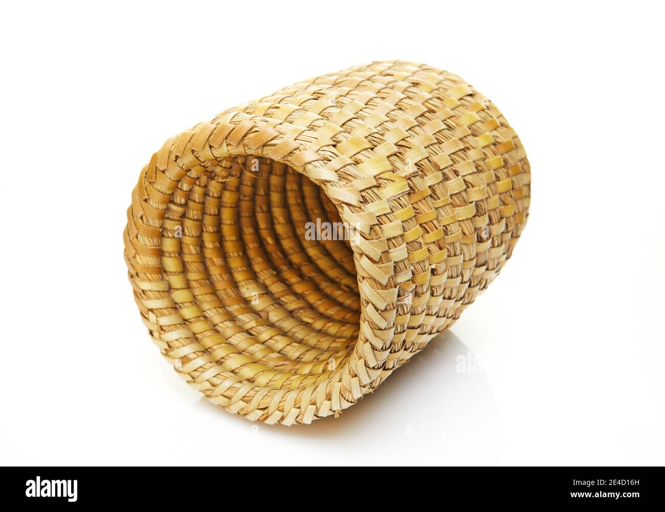 Handmade natural product, round wicker basket, rattan weaving. Eco friendly and sustainable