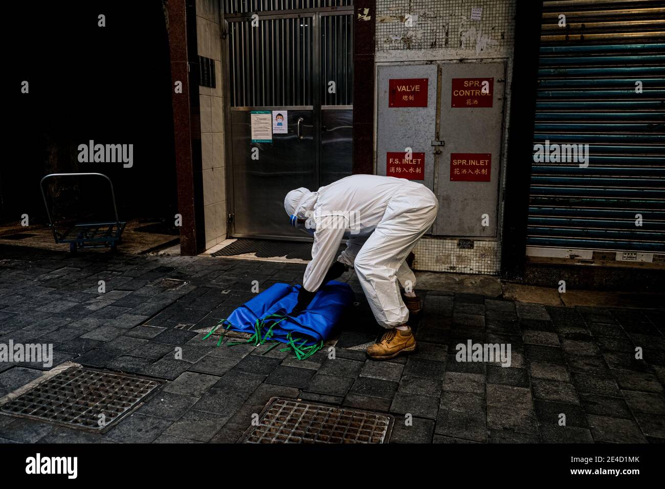 Hong Kong, China. 23rd Jan, 2021. Government worker wears personal