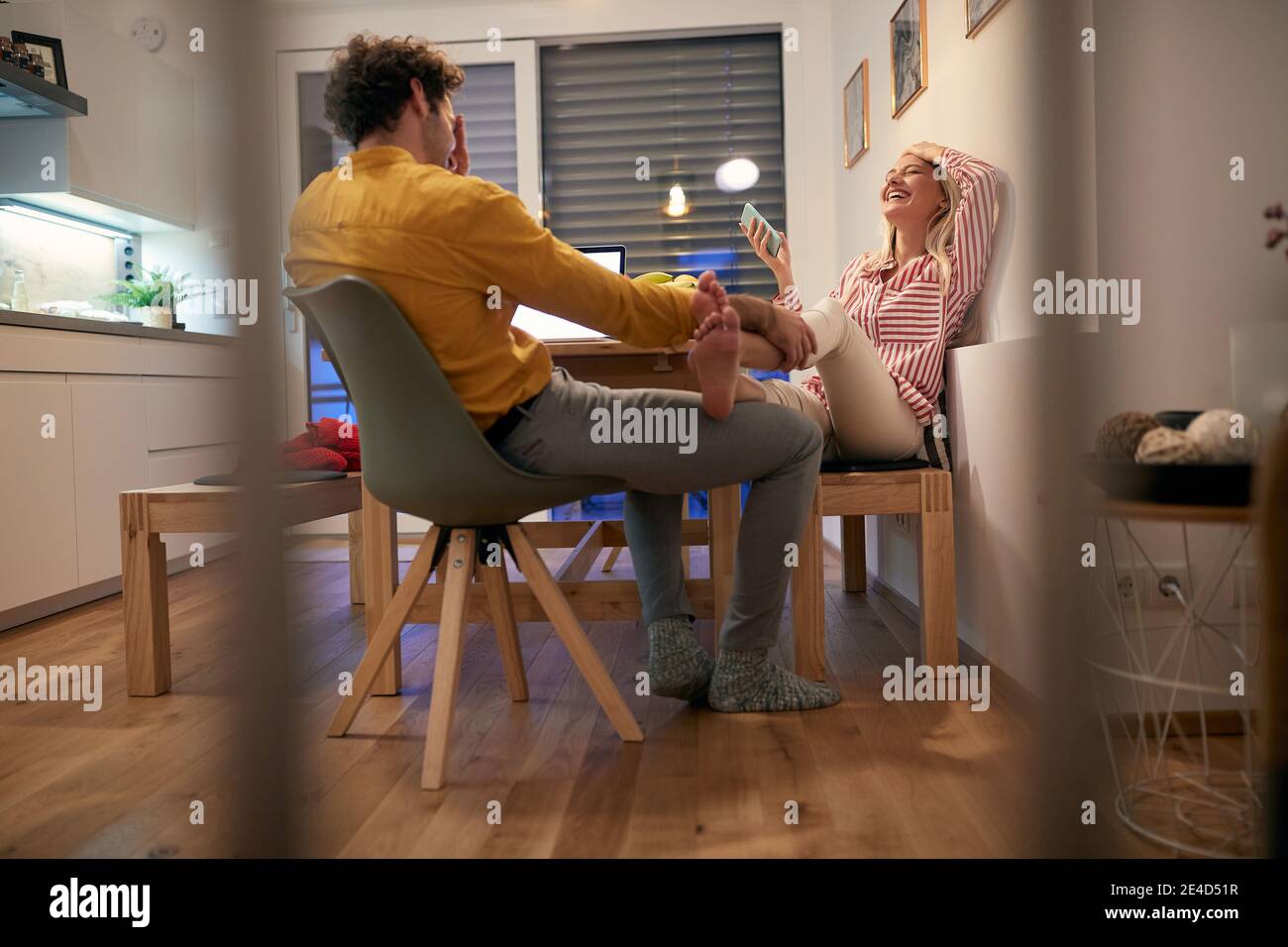 Cute couple spending time together at home; Bonding couple concept Stock Photo