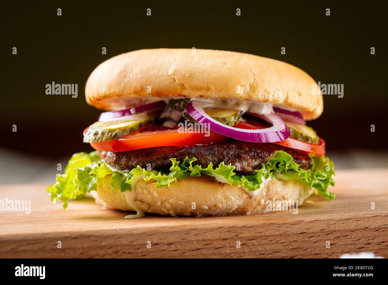 Closeup on classic hamburger with beef patty Stock Photo Alamy