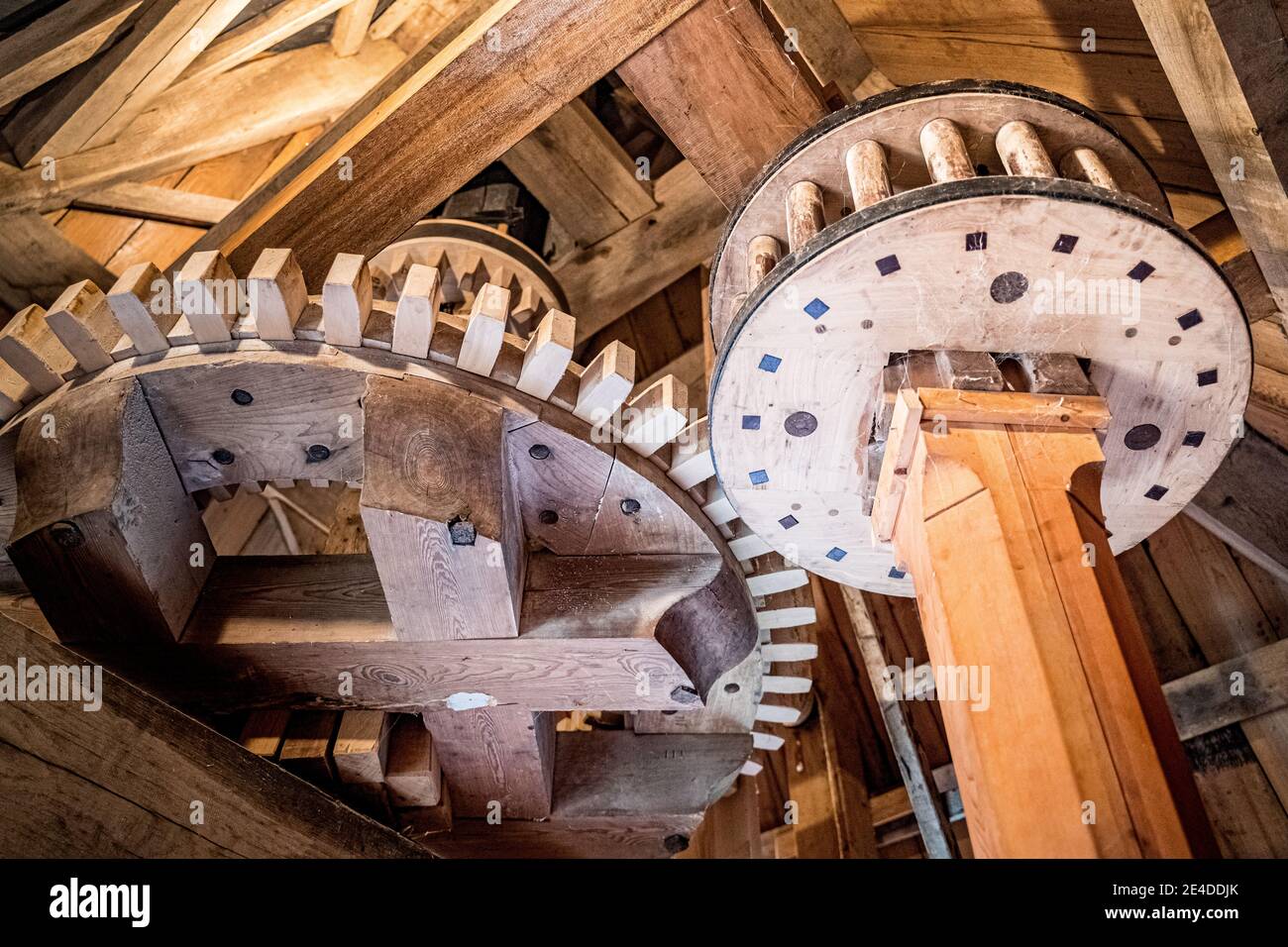 Radars and rotating parts of a traditional wooden windmill for grinding