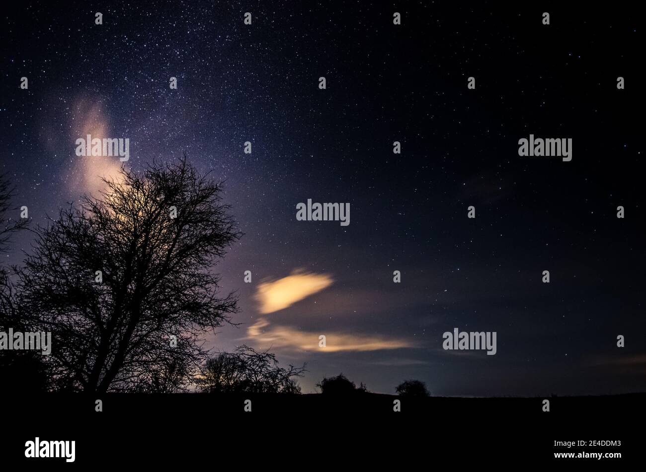 Starry night sky stars clouds hi-res stock photography and images - Alamy