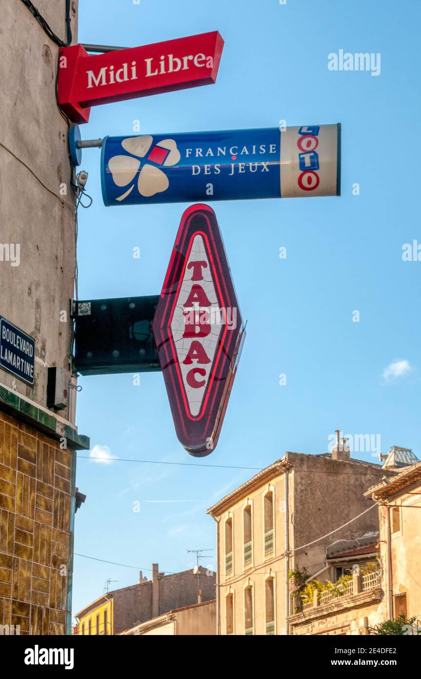 Signs on a French newsagents and tobacconists. Stock Photo