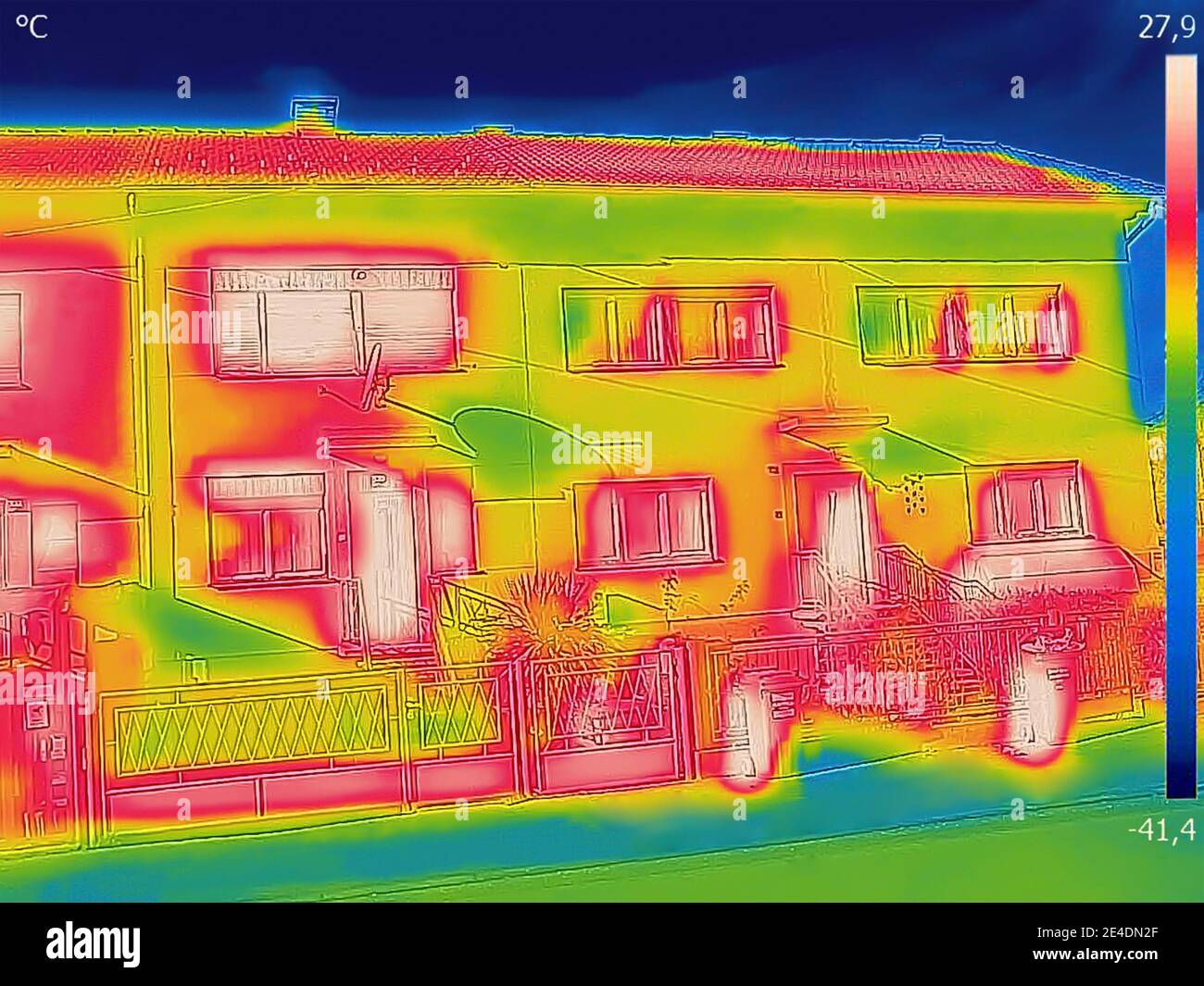 Thermal image of a family house where heat loss is seen Stock Photo
