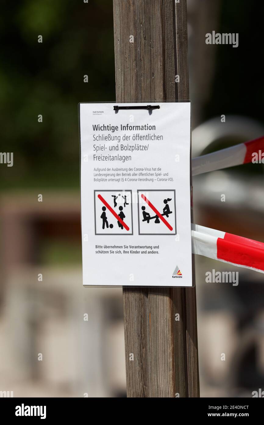 notification sign, covid-19, pandemia, playground, Germany Stock Photo