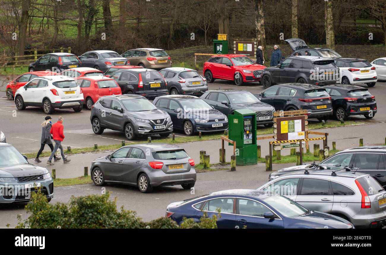 People walk through the car park at Bradgate Park in Leicestershire during England's third national lockdown to curb the spread of coronavirus. Picture date: Saturday January 23, 2021. Stock Photo