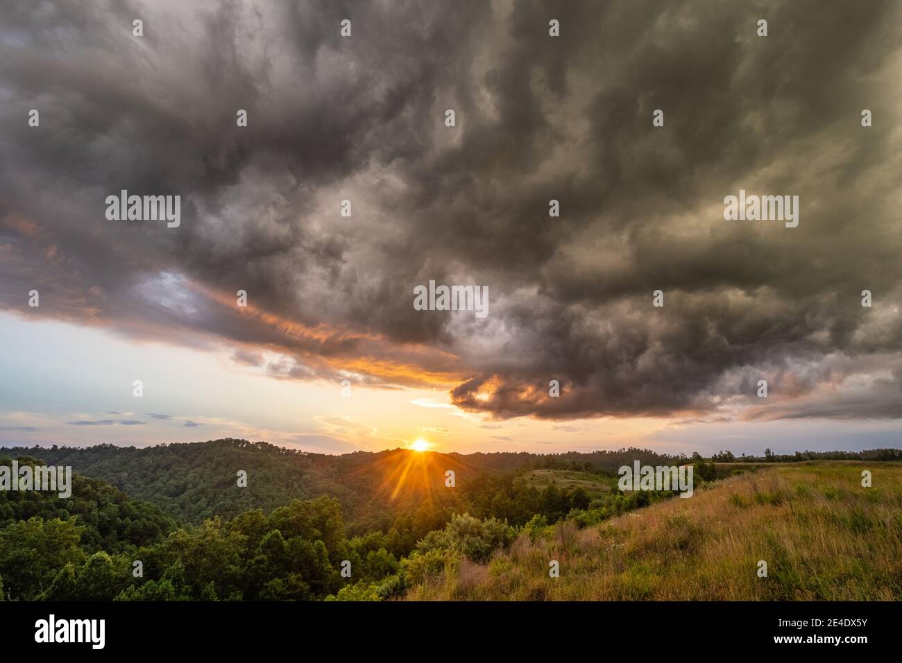 The final evening light as the sun sets over hills in Central Appalachia. Stock Photo