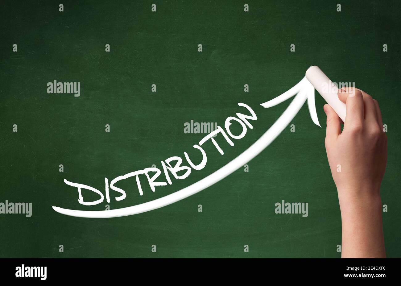 Hand drawing DISTRIBUTION inscription with white chalk on blackboard ...