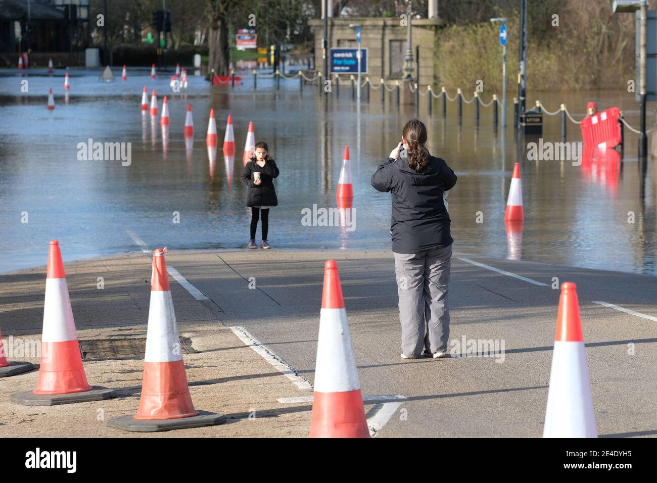 Worcester, Worcestershire, UK - Saturday 23rd January 2021 - Visitors come to see the floods as riverside roads and some businesses are flooded in the centre of Worcester after the River Severn overflowed. The Severn is expected to peak in Worcester later this evening.  Photo Steven May / Alamy Live News Stock Photo