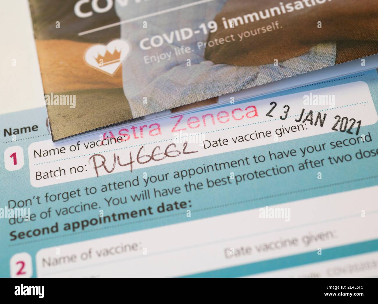 London, UK. 23 January 2021. A Covid-19 vaccination card showing first AstraZeneca vaccine given. The Oxford/AstraZeneca has not yet been approved by the EU. Credit: Malcolm Park/Alamy Live News. Stock Photo