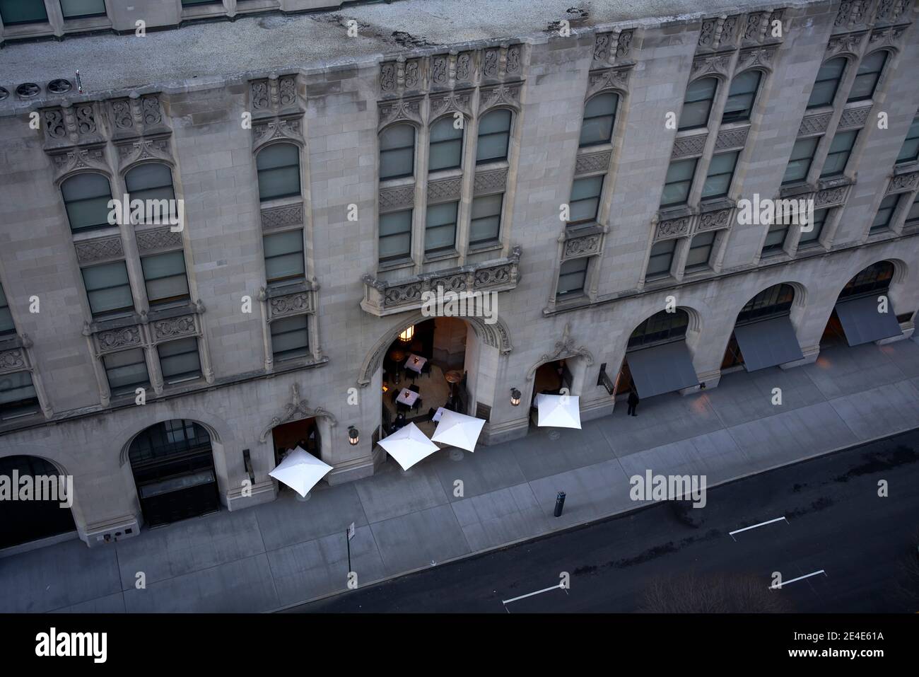 Looking down on a restaurant with outdoor dining on a sidewalk in New York City. Stock Photo