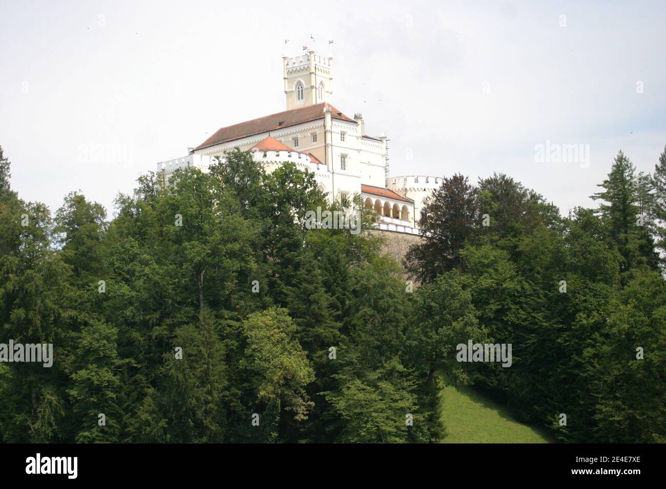 The 13th century Trakošćan battlement on the top of the hill, Varaždin County, Croatia, surrounded by thick forest Stock Photo
