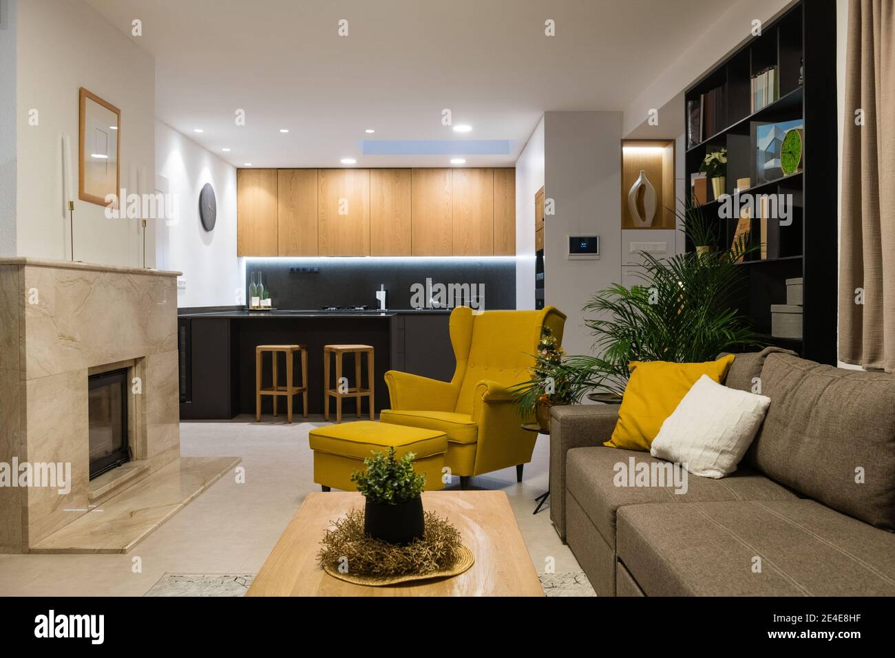 Interior of livingroom connected with kitchen in a modern house Stock