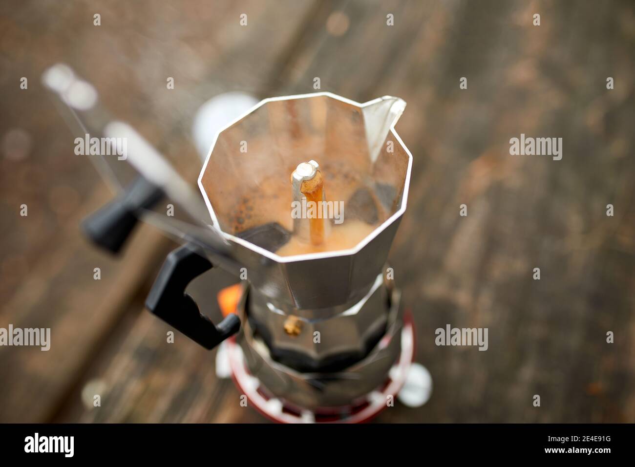 Process of making camping coffee outdoor with metal geyser coffee maker on  a gas burner, step by step. Travel activity for relaxing, bushcraft, advent  Stock Photo - Alamy