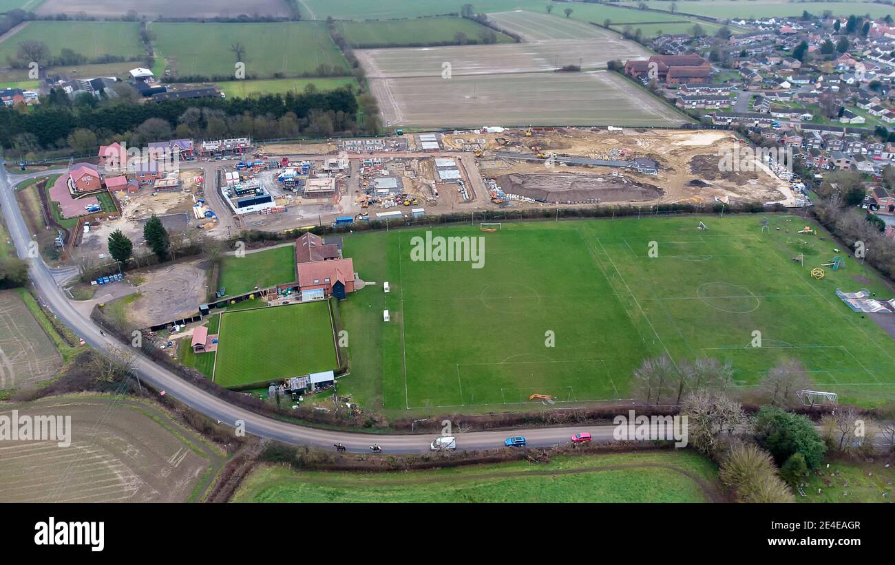 A new housing development in a rural village in Suffolk, UK Stock Photo