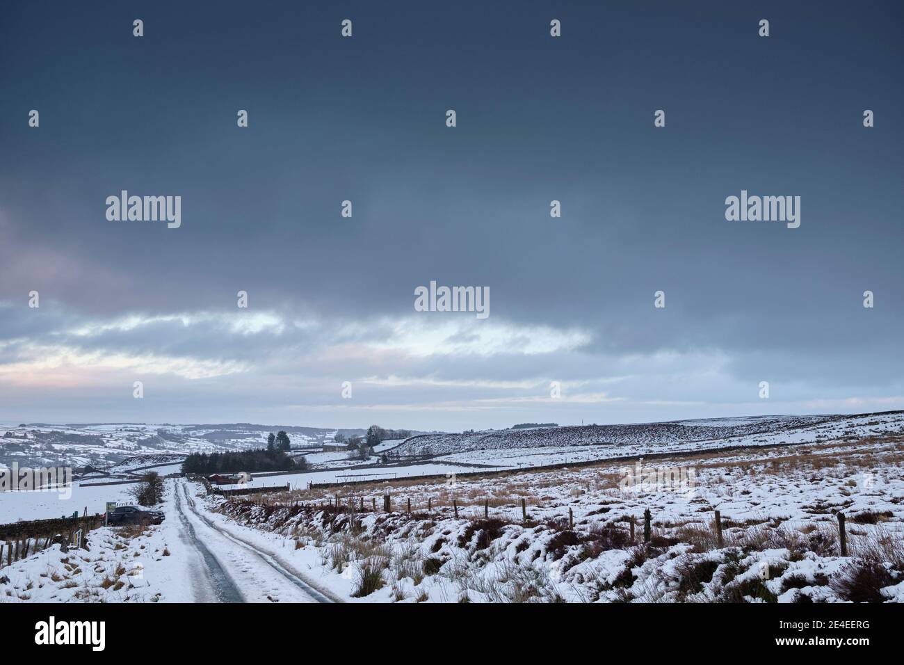 Snow and hazy skies all day and looking North East over Nidderdale in Yorkshire Dales Stock Photo