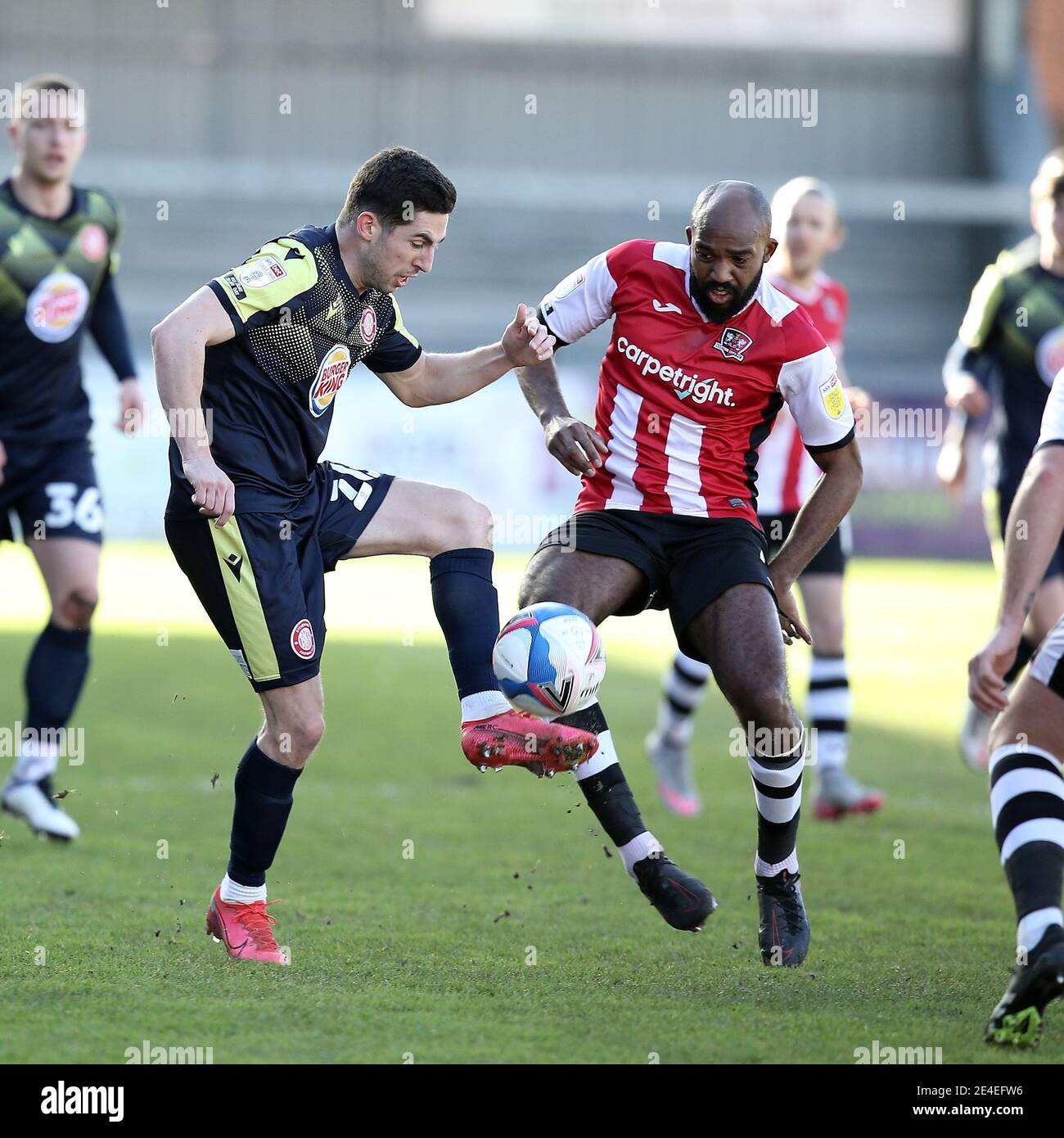 Exeter, UK. 23rd Jan, 2021. Nigel Atangana of Exeter City and Tom Pett