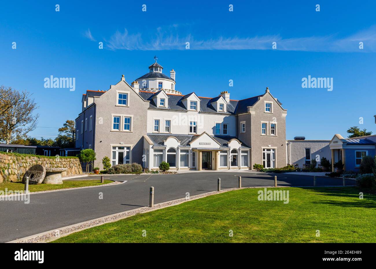 The entrance to and exterior of Twr y Felin Hotel and restaurant in St Davids, a small cathedral city in Pembrokeshire, southwest Wales on a sunny day Stock Photo