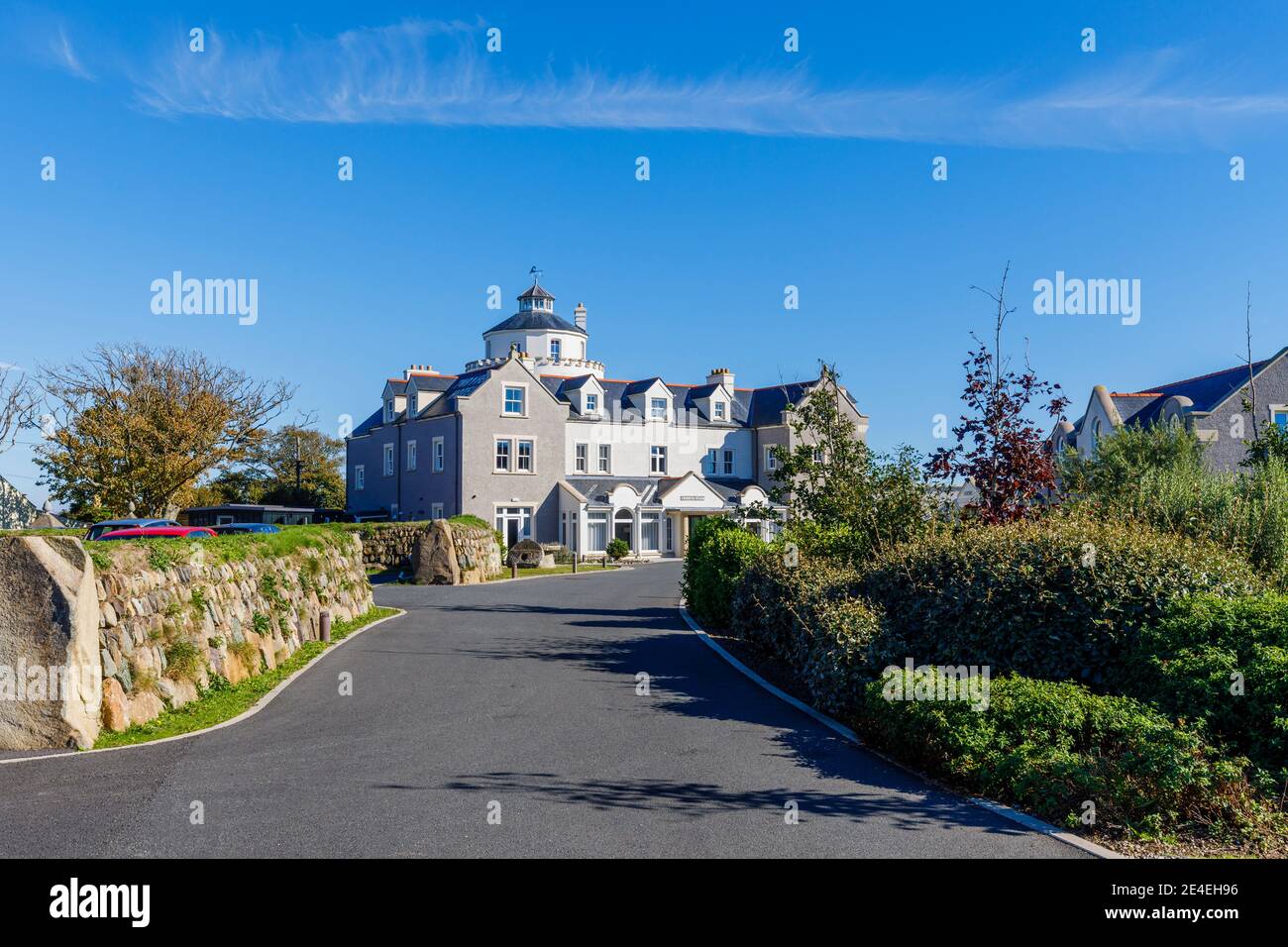 The entrance to and exterior of Twr y Felin Hotel and restaurant in St Davids, a small cathedral city in Pembrokeshire, southwest Wales on a sunny day Stock Photo