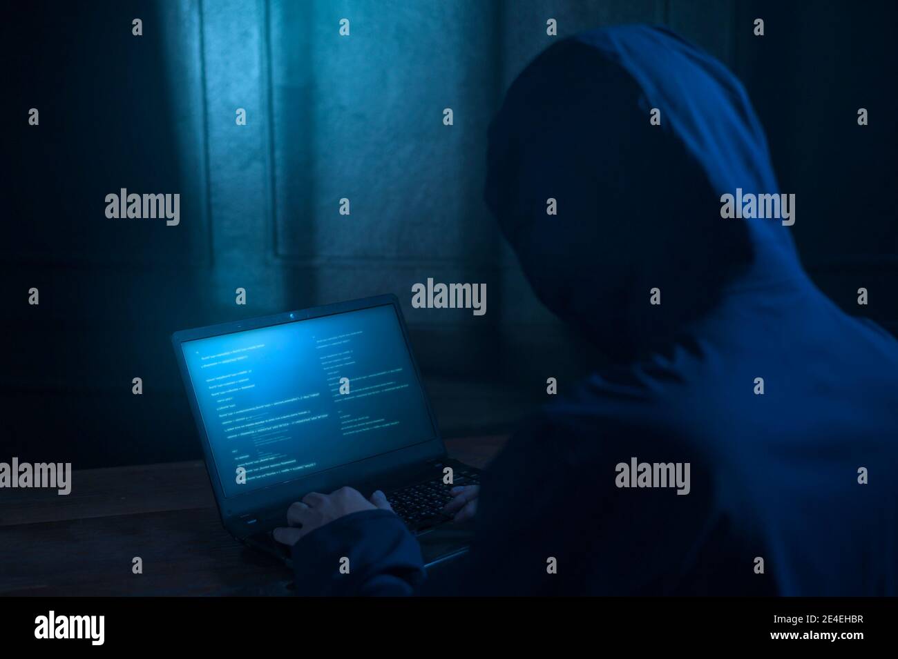 Hacker Switching Off A Computer A Hacker is using laptop computer to steal data in the night Stock ...