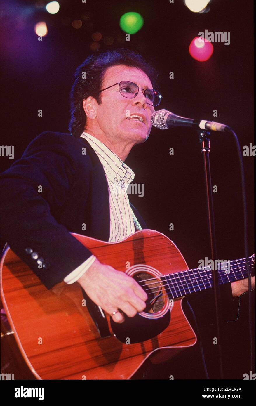 Sir Cliff Richard Performing at the 'Children In Crisis' Concert held at the London Docklands Arena, London, UK. 10th December 1997 Stock Photo