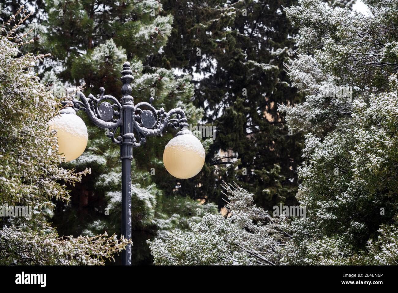 Street lamp covered with snow Stock Photo - Alamy