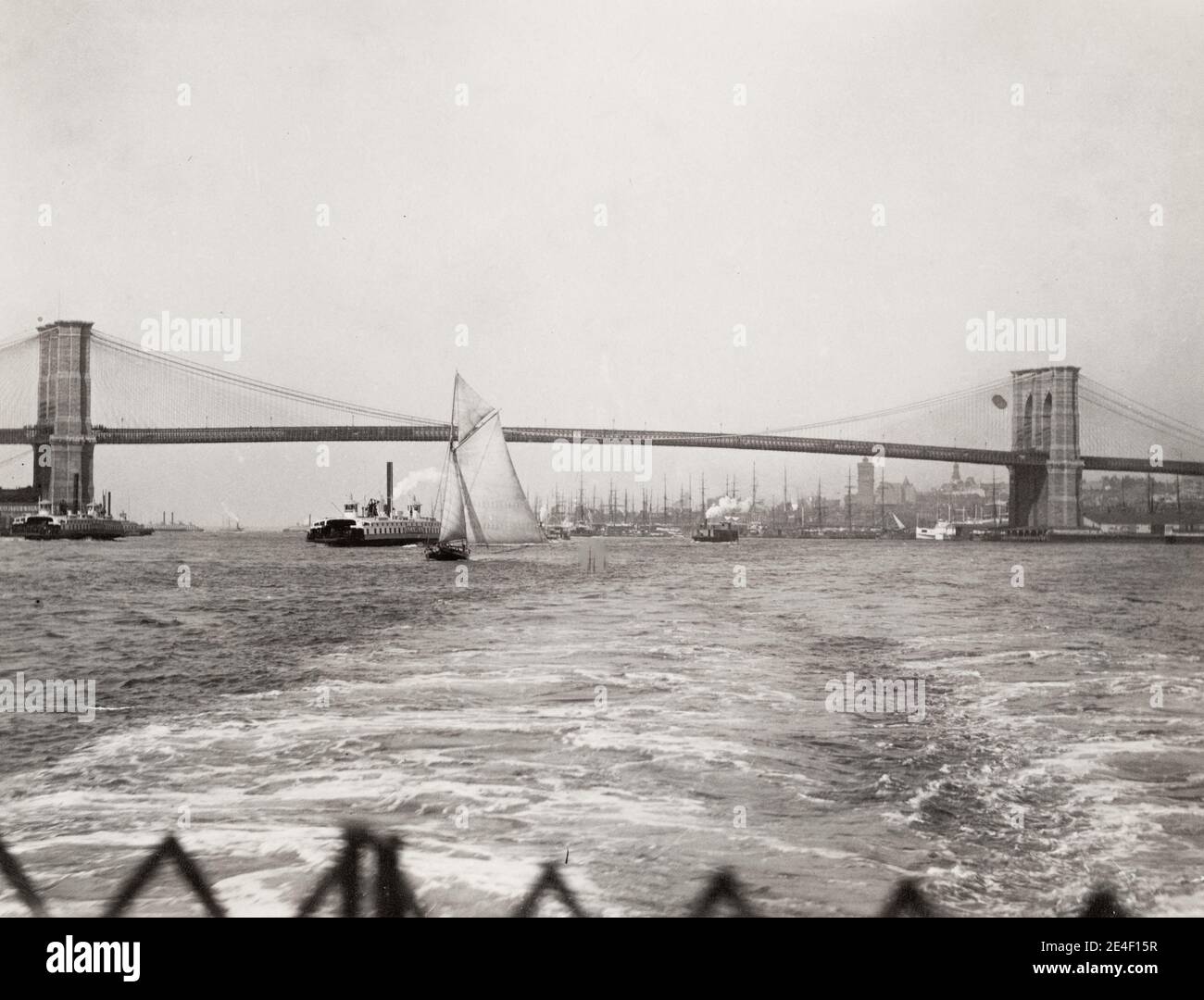 Vintage 19th century photograph: Brooklyn Bridge from the East River ...