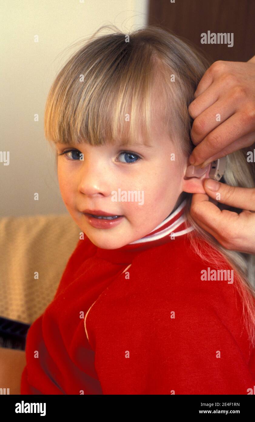 Child hearing aid hires stock photography and images Alamy