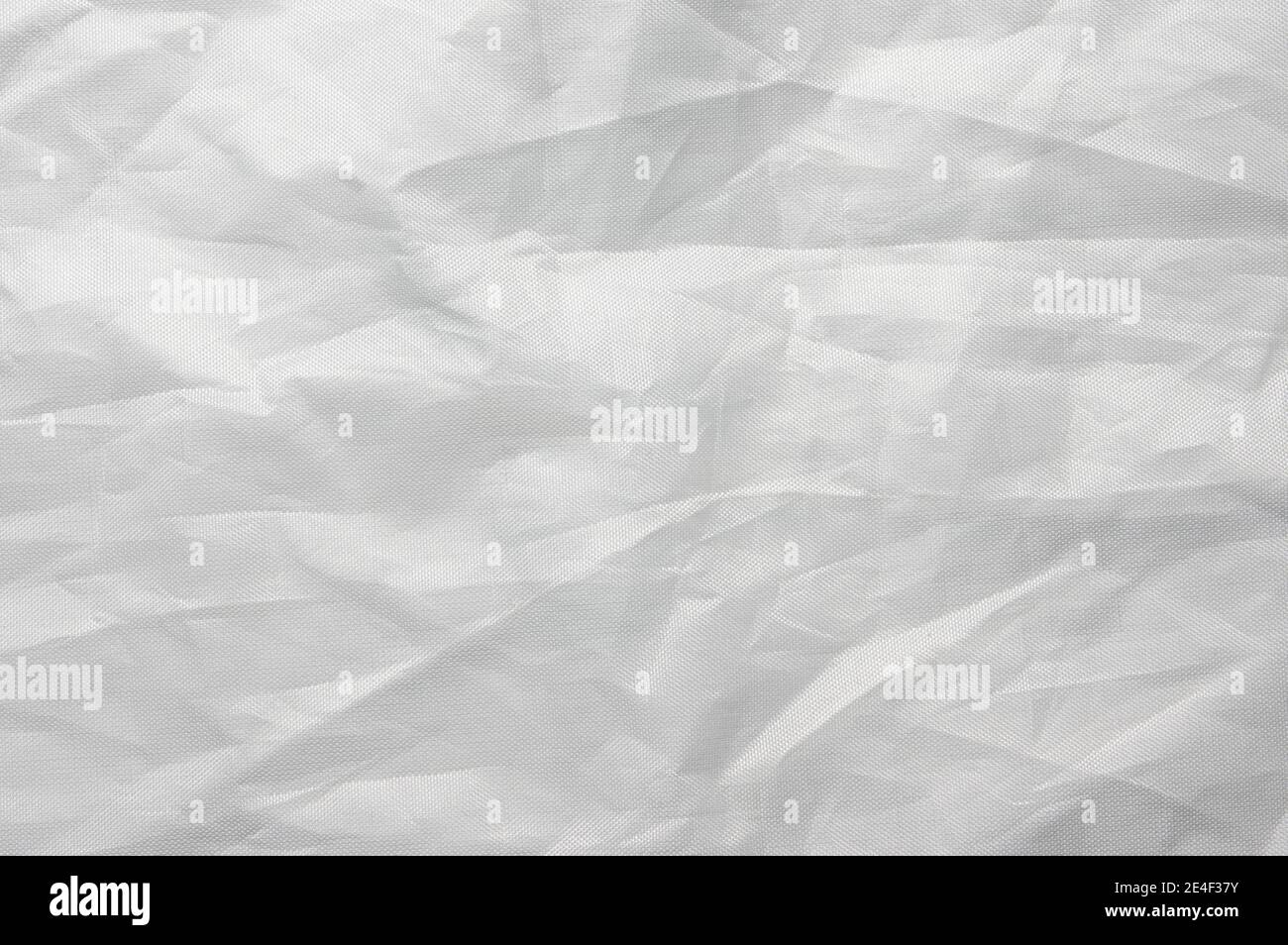 crumpled  white Nylon background, textured Stock Photo