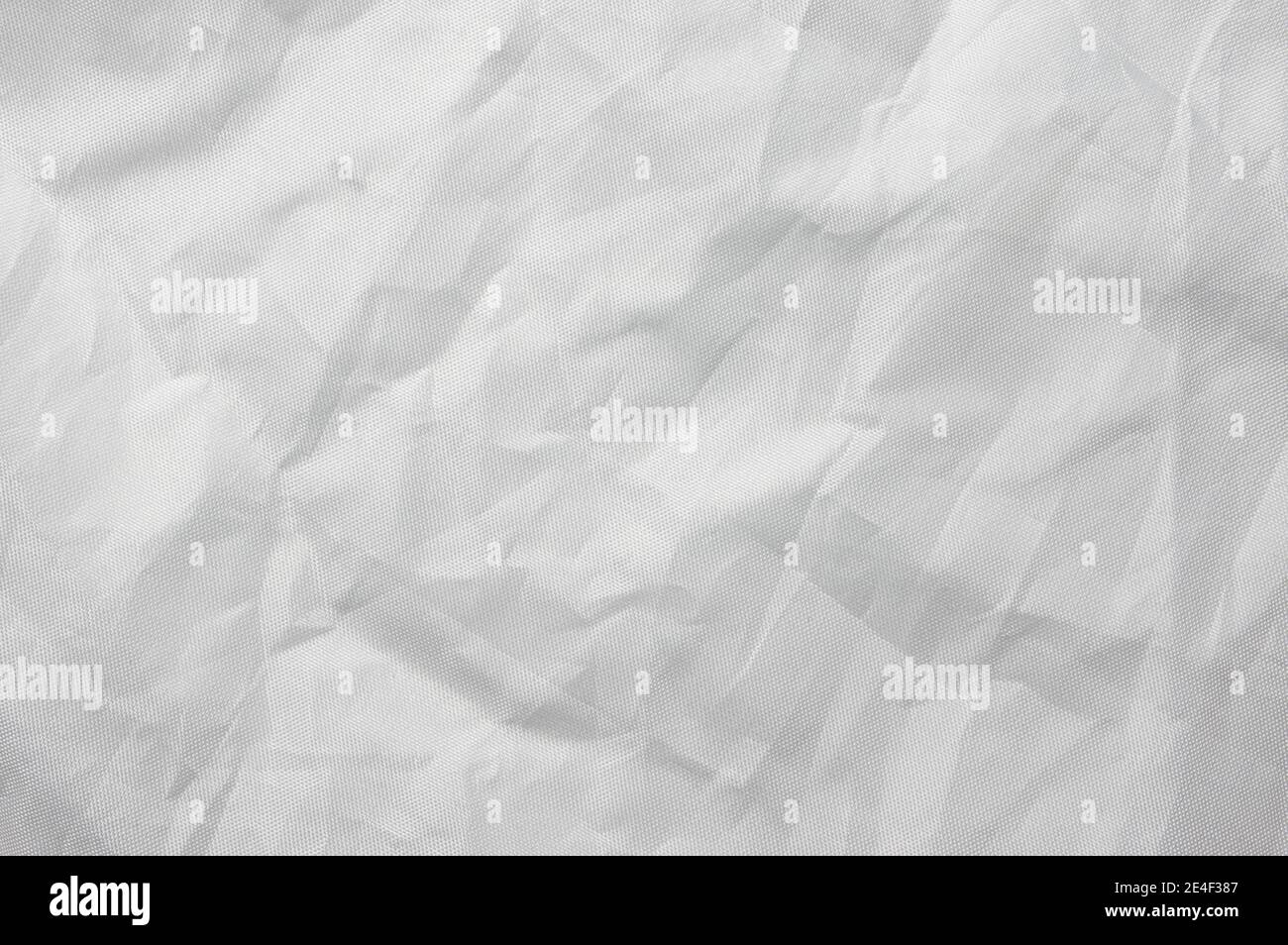 crumpled  white Nylon background, textured Stock Photo