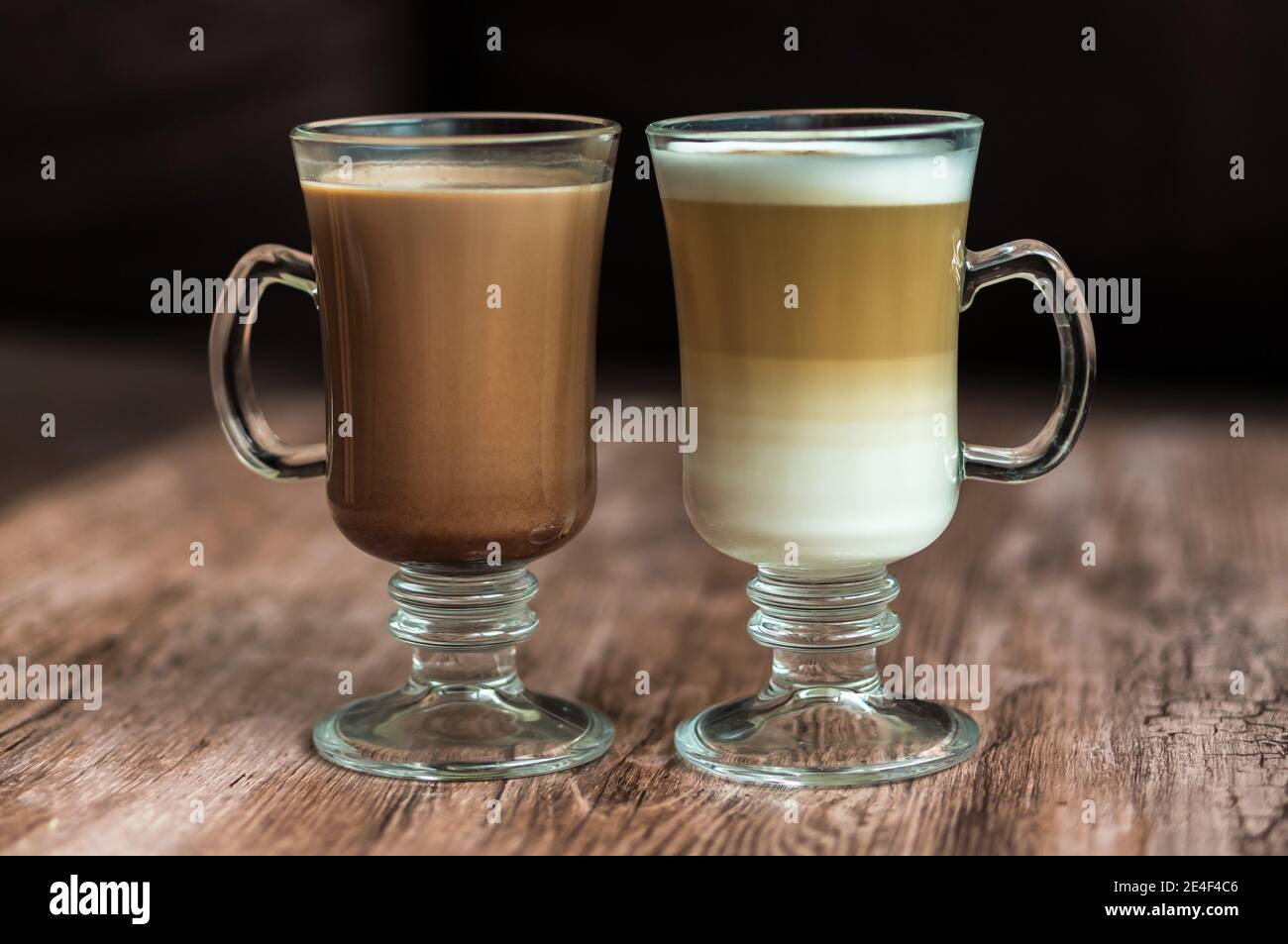 Coffee cup with a heart on wooden table Stock Photo