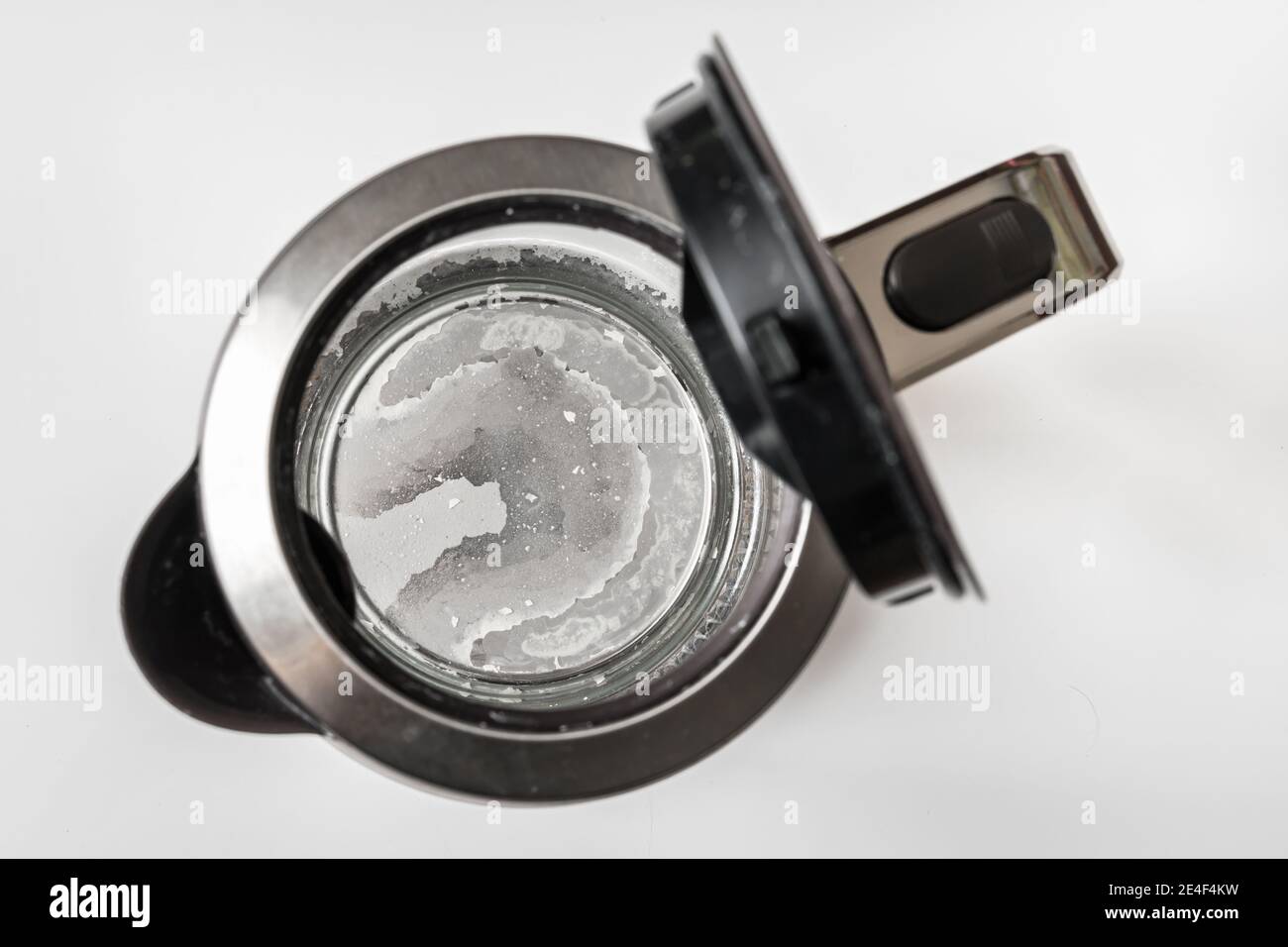 Limescale at the bottom of kettle hard water and calcium concept