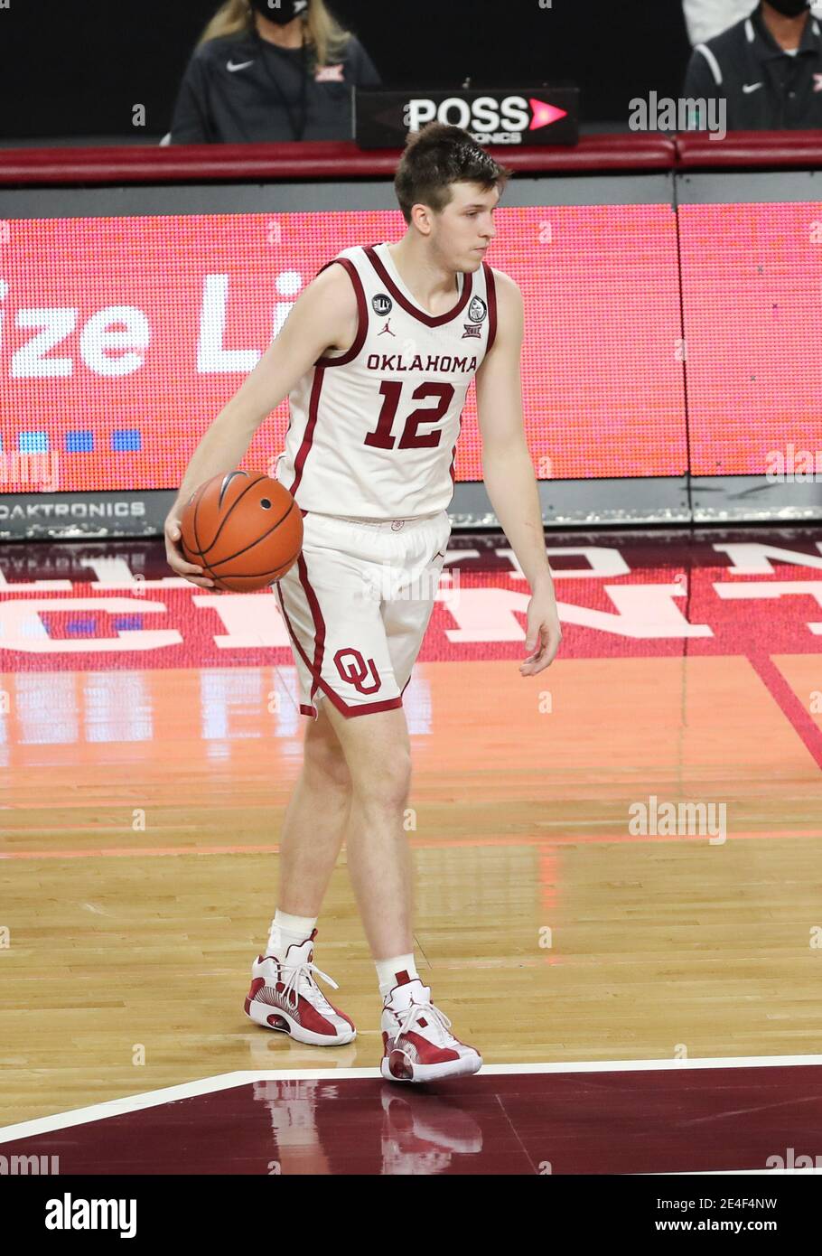 Norman, OK, USA. 23rd Jan, 2021. Oklahoma Sooners guard Austin Reaves (12) dribbles the ball up the court during a basketball game between the Kansas Jayhawks and Oklahoma Sooners at Lloyd Noble Center in Norman, OK. Gray Siegel/CSM/Alamy Live News Stock Photo
