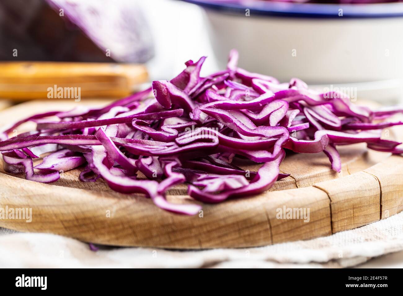 Sliced fresh red cabbage on cutting board. Stock Photo