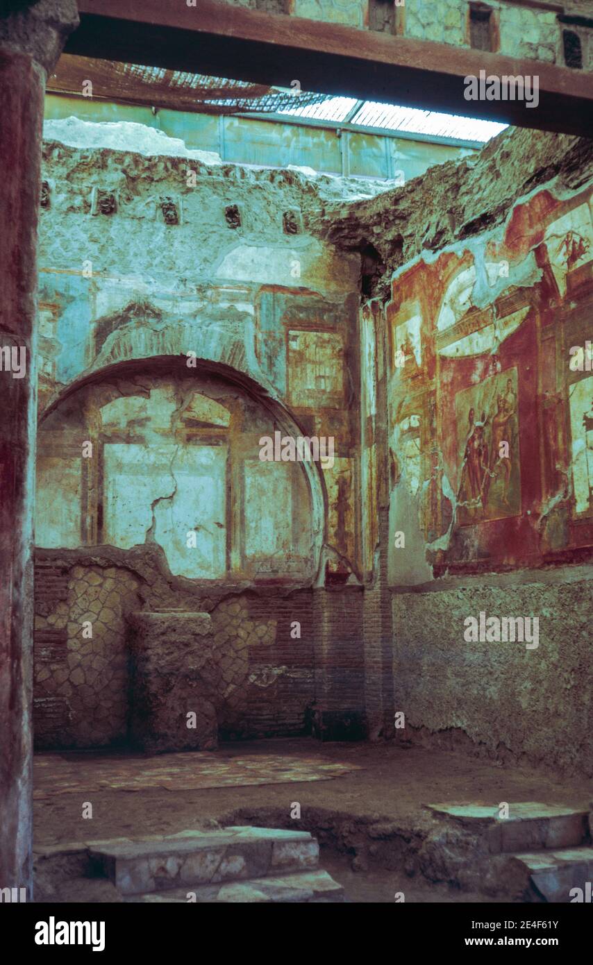 Ruins of Roman city Herculaneum (Ercolano) in Campania, Italy, buried under volcanic ash the same time as Pompeii. Shrine of the Augustali. Archival scan from a slide. April 1970. Stock Photo
