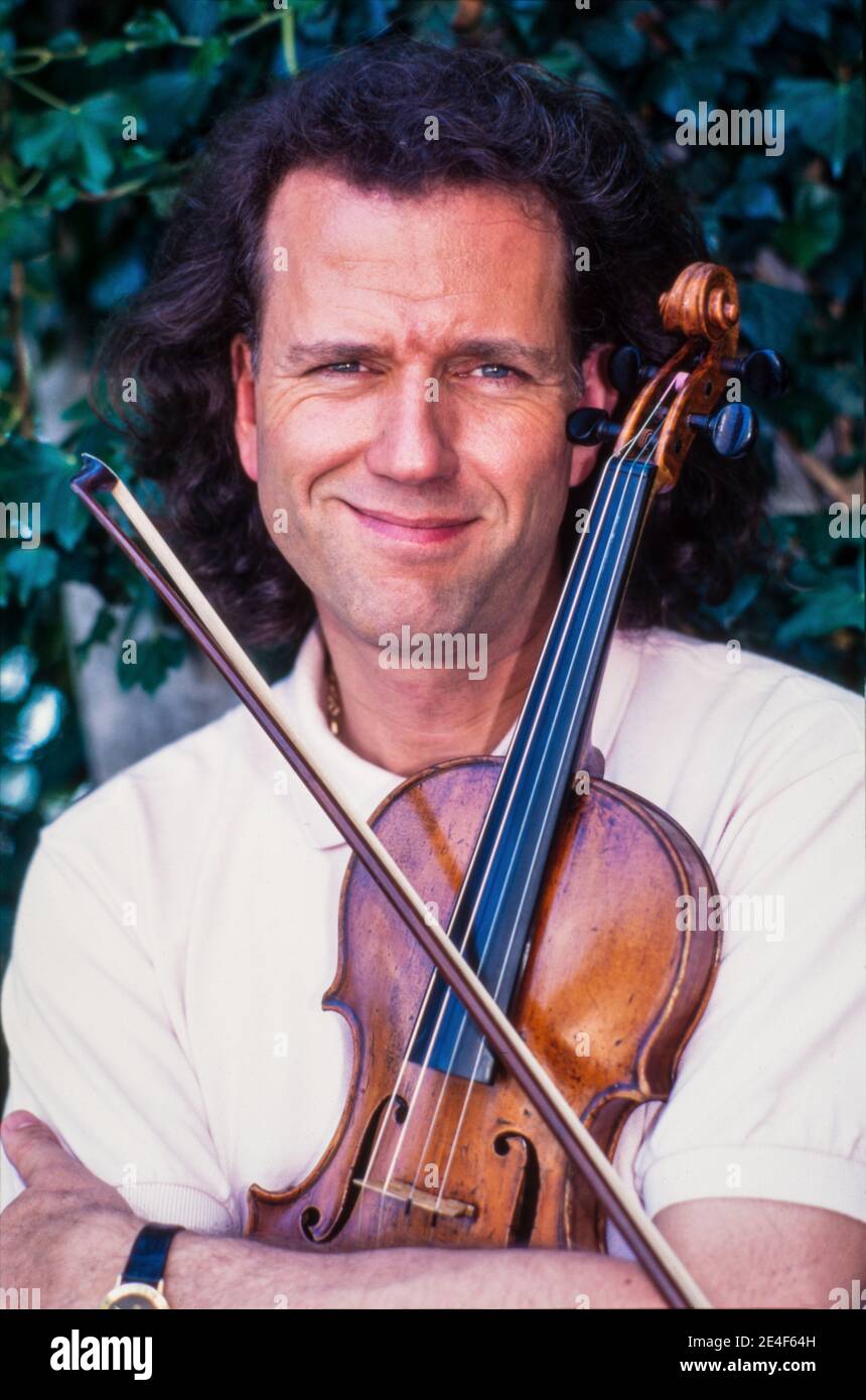MAASTRICHT, THE NETHERLANDS - MAY 11, 1996: Andre Rieu is a Dutch violinist and conductor best known for creating the waltz-playing Johann Strauss Orc Stock Photo