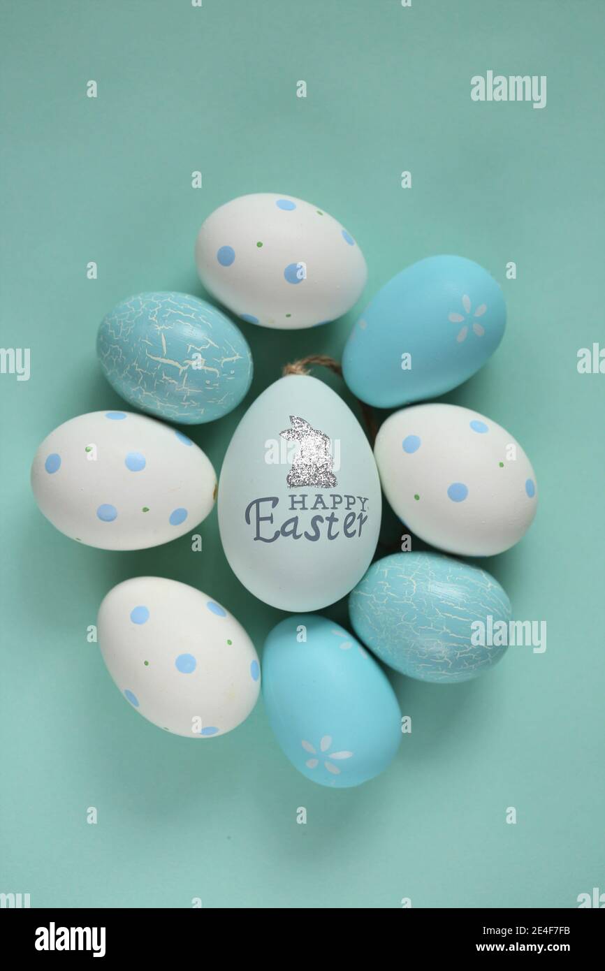 Easter holiday. Blue and white speckled Easter eggs with bunny on a