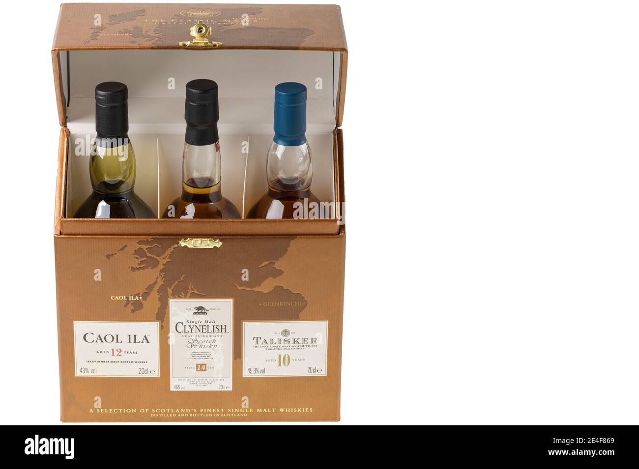 Close up view of set of finest Scotland whiskey bottles isolated on white background. Stock Photo