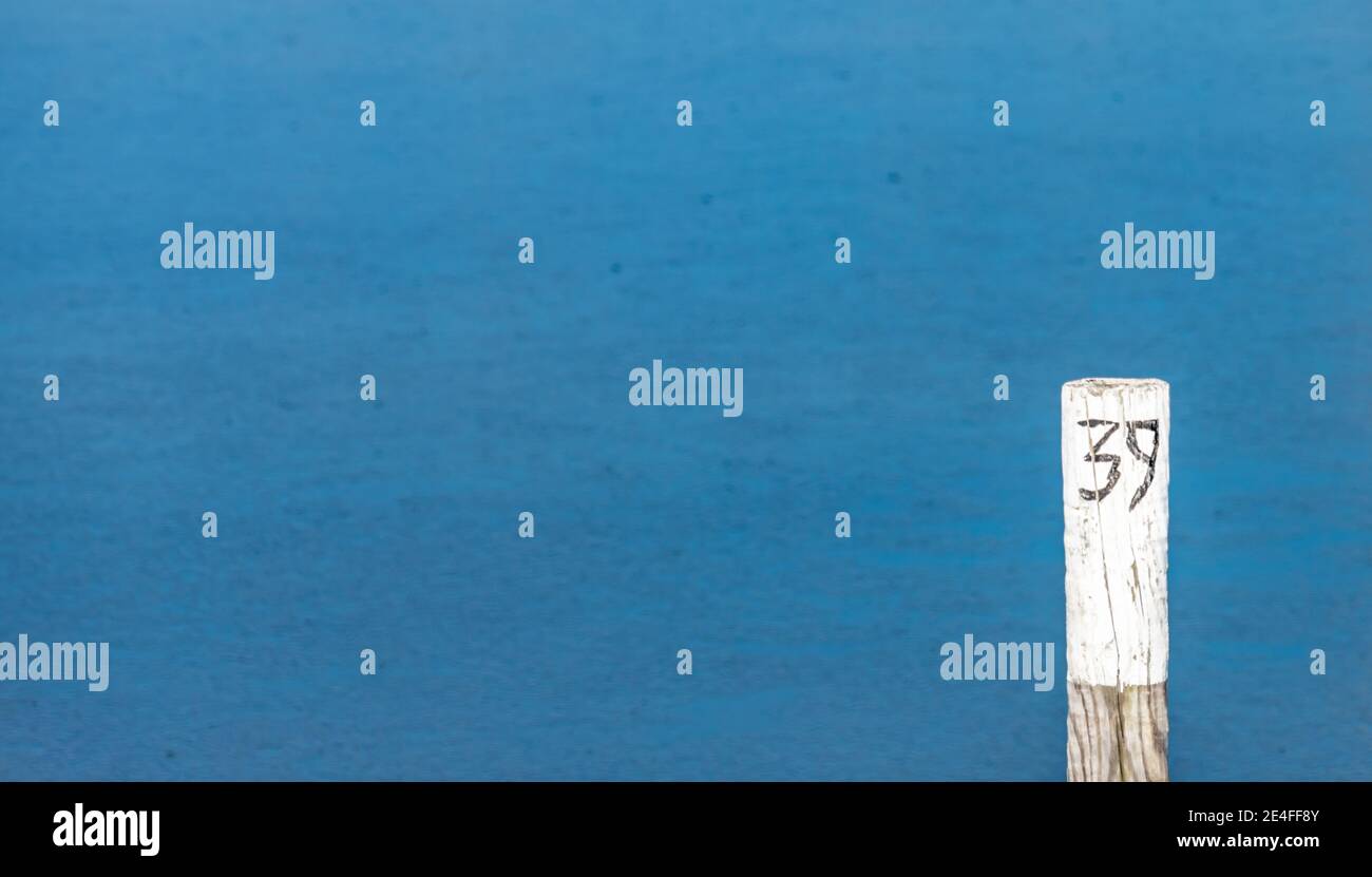 The number 39 on a post with a blue background Stock Photo