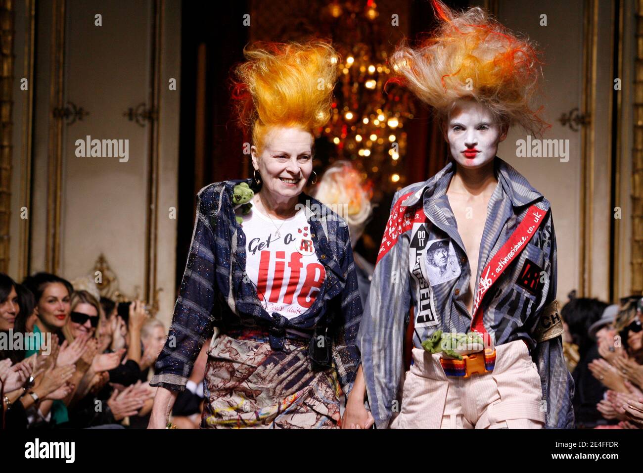 British designer Vivienne Westwood appears with models on