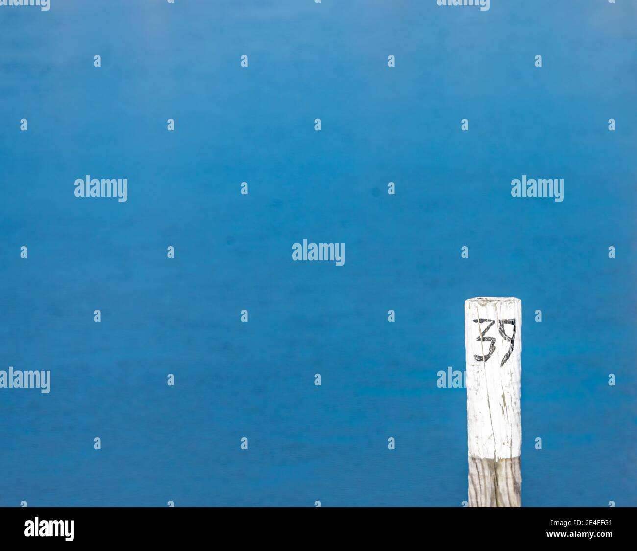 The number 39 on a post with a blue background Stock Photo