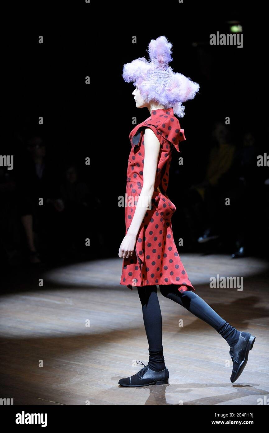 A model diplays a creation by Japanese designer Rei Kawakubo for