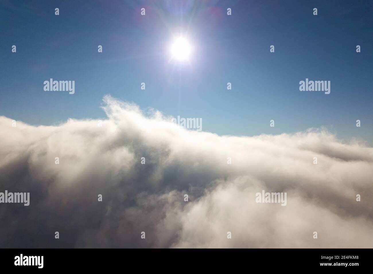 Aerial view from above of white puffy clouds Stock Photo - Alamy