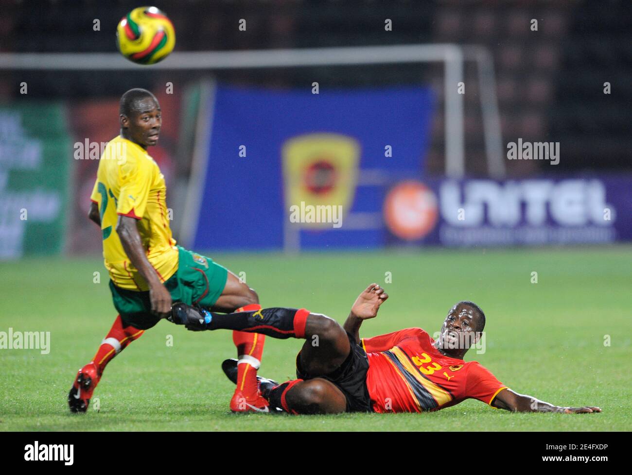 Cameroon's Enoh Eyong battles for the ball Angola's Kivuvu during a Friendly soccer Match, Cameroon vs Angola in Olhao, Portugal on October 14, 2009. The match ended in a 1-1 draw. Photo by Henri Szwarc/ABACAPRESS.COM Stock Photo