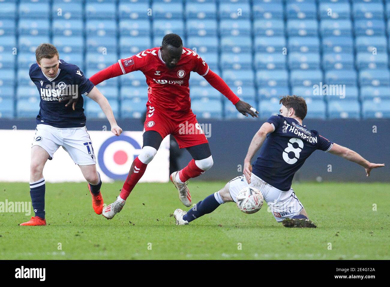 London, UK. 23rd Jan, 2021. Famara Diedhiou of Bristol City is challenged by Ben Thompson of Millwall during the FA Cup 4th Round match between Millwall and Bristol City at The Den, London, England on 23 January 2021. Photo by Ken Sparks. Editorial use only, license required for commercial use. No use in betting, games or a single club/league/player publications. Credit: UK Sports Pics Ltd/Alamy Live News Stock Photo