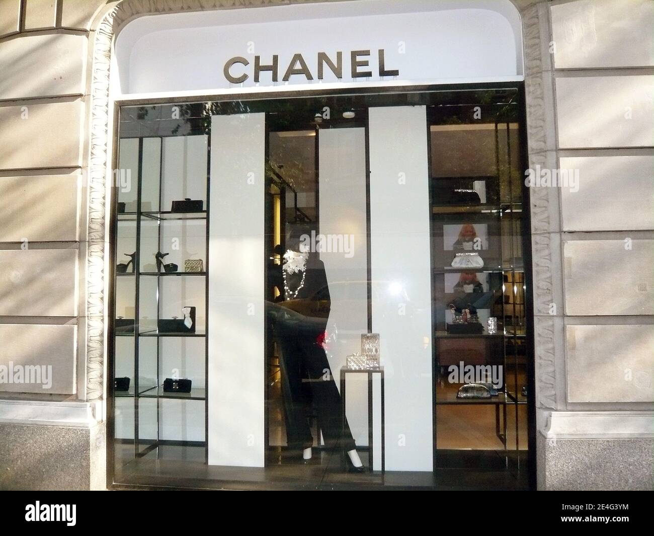 A Lily Allen's model is pictured in the windows of the Chanel store on 57th  Street, styled identically to Allen's ad spread, shot by the Karl Lagerfeld  himself, in New York City,