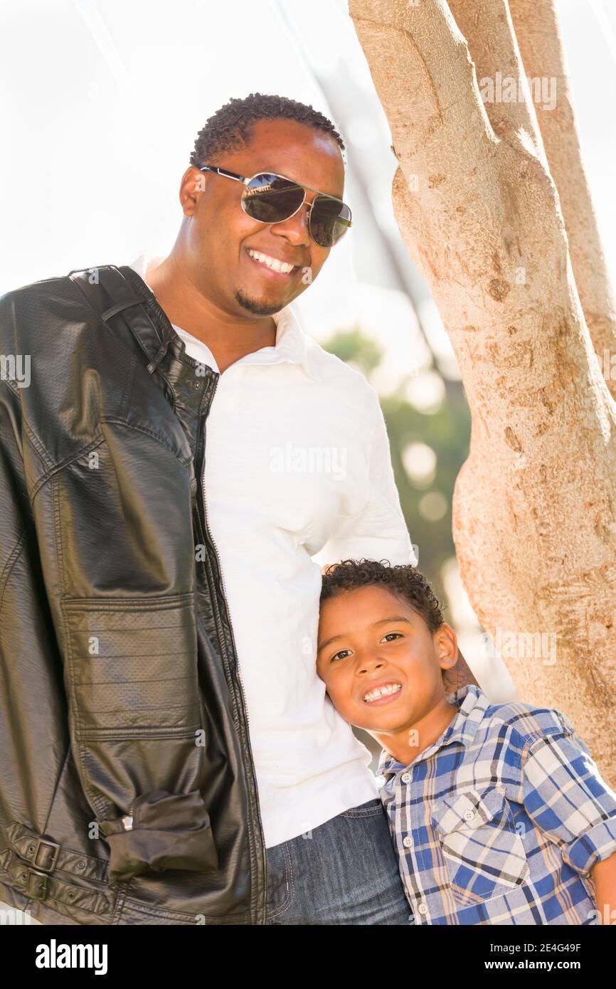 Happy African American Father and Mixed Race Son Playing At The Park ...