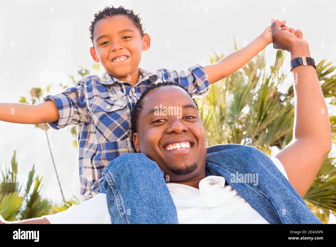 Happy African American Father and Mixed Race Son Playing At The Park ...