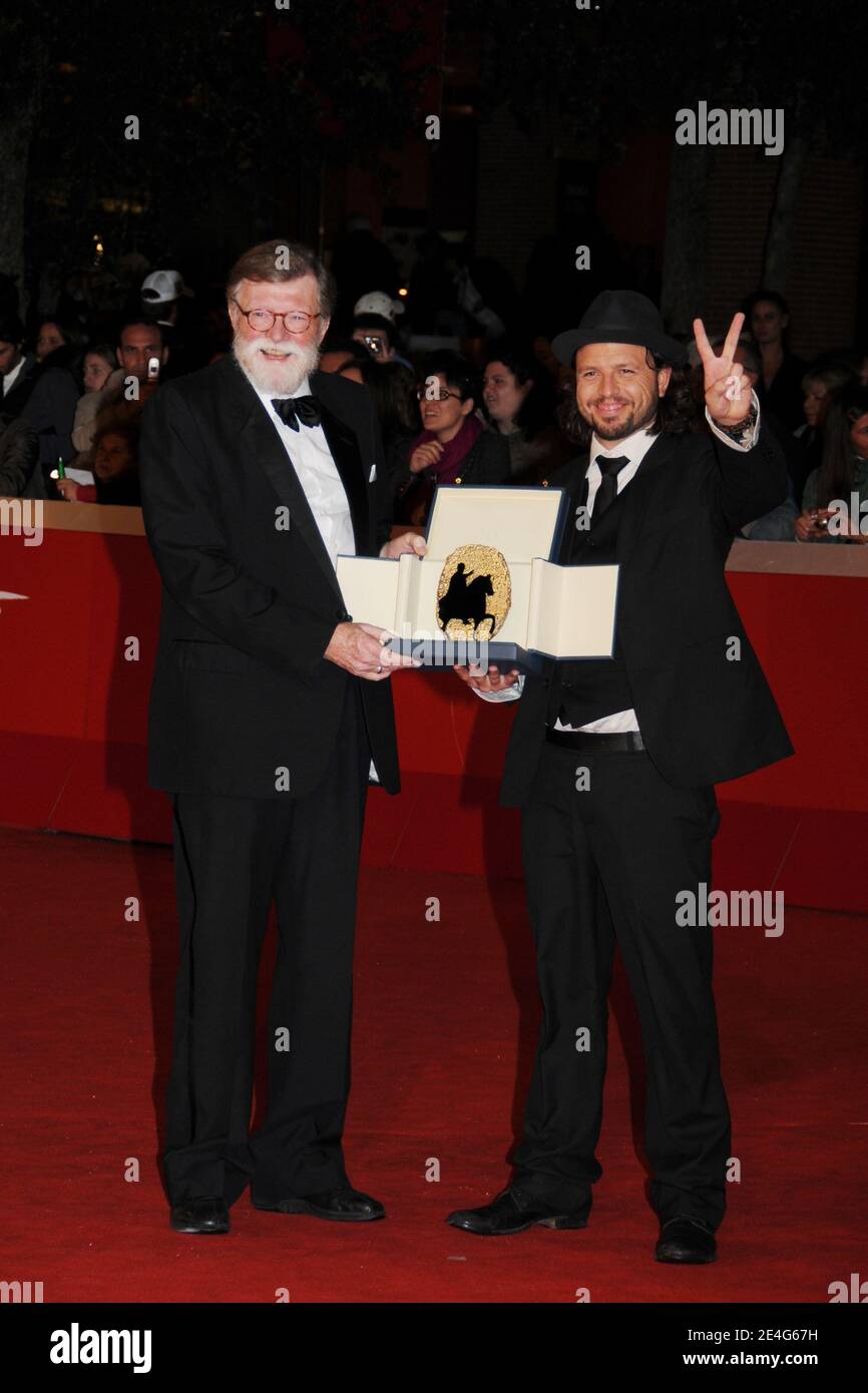 Director Nicolo Donato (R), winner of the Golden MarcÍAurelio Jury Award for best film for 'Brotherhood' poses with his award alongside producer Per Holst at the closing ceremony of the 4th Rome Film Festival in Rome, Italy on October 23, 2009. Photo by Mireille Ampilhac/ABACAPRESS.COM Stock Photo