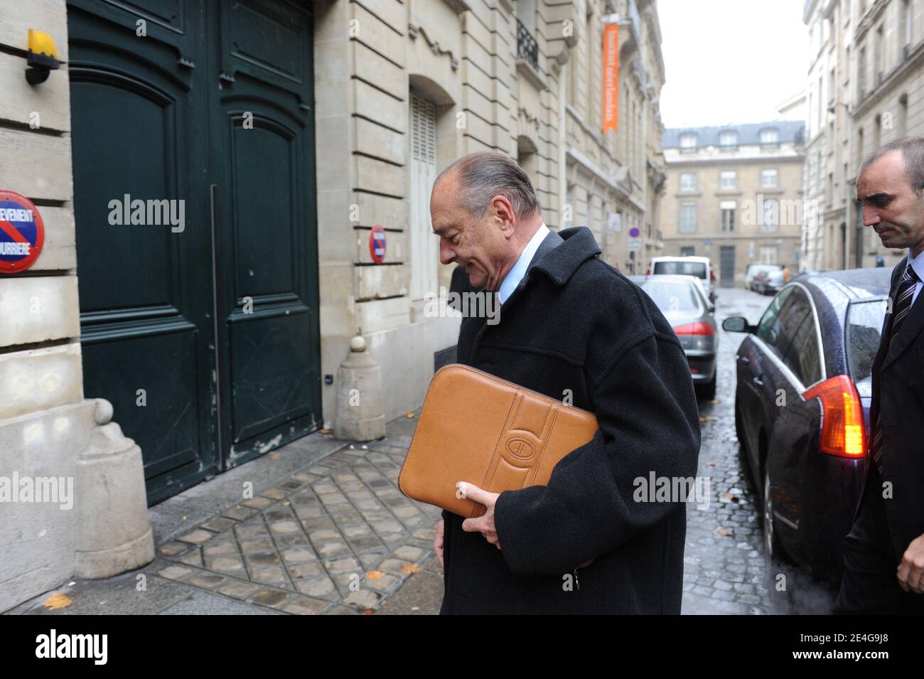 Former French president Jacques Chirac arrives at his office in Paris, France, on November 3, 2009. Jacques Chirac will be the first former French president to be tried for corruption, officials said, after charges from his years as mayor of Paris returned to taint the twilight of his long career. Jacques Chirac stands accused of giving political allies lucrative bogus jobs as city hall 'ghost workers' and his trial will be the latest in a series to expose graft and dirty tricks at the highest levels of state. Photo by Mousse/ABACAPRESS.COM Stock Photo